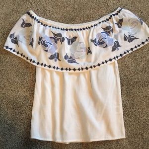 Off the shoulder floral top.